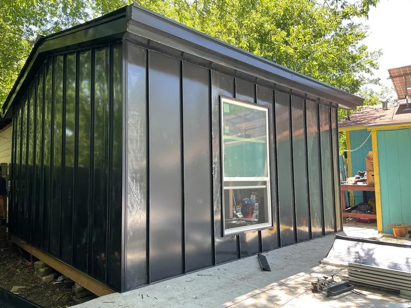 Black standing seam metal wall panels for Roof Inspection in Indio