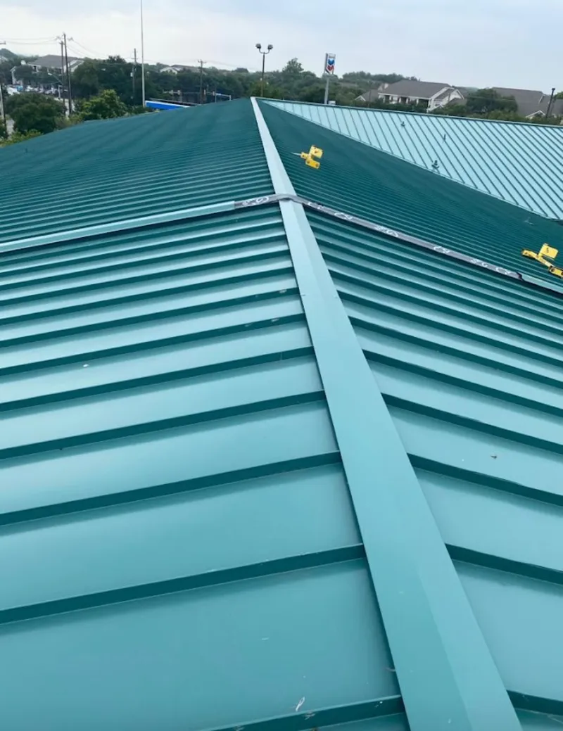 Green commercial metal roof ridge and valley for Metal Roof Repair in Indio